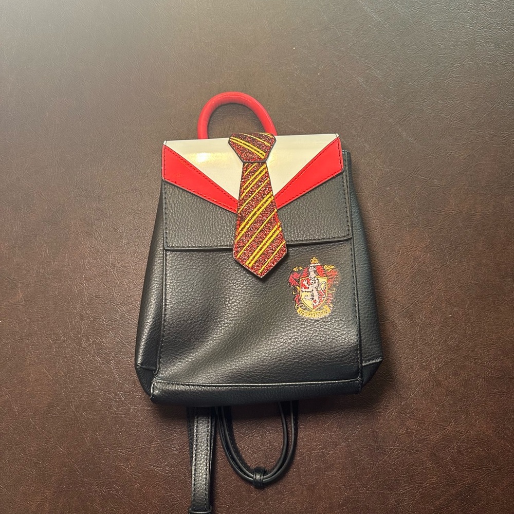 Danielle Nicole Black and Red Hogwarts Backpack- Gryffindor Neck Tie